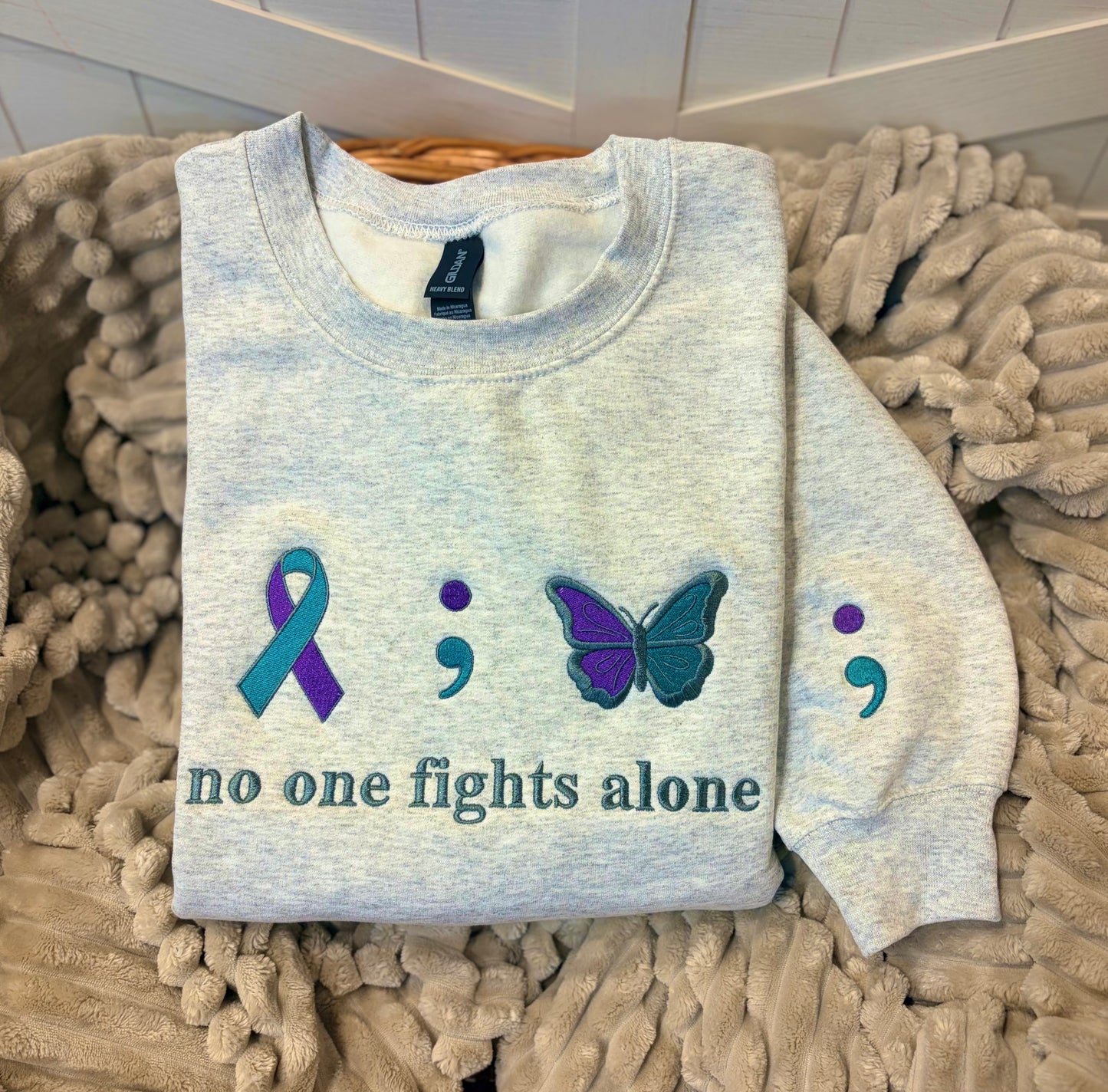 Embroidered No One Fights Alone Sweatshirt